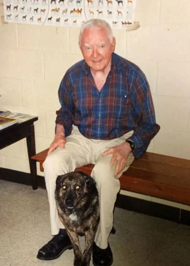 veterinarian with pet canine