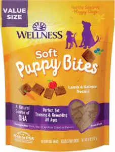 Wellness Soft Puppy Bites — tasty natural dog chews made with lamb and salmon. Perfect for training puppies and rewarding good behavior with healthy, grain-free ingredients.