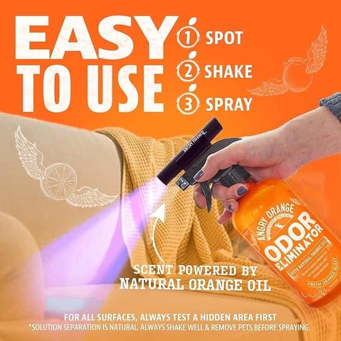 Angry Orange odor eliminator spray being used on a couch — a powerful Amazon pet find that neutralizes pet smells fast. This unique pet gadget uses natural orange oil to clean and freshen your home, making it one of the best Amazon pet gifts 2025 for dog and cat owners looking for easy, fun pet toys and cleanup solutions.