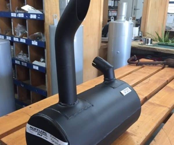 High-performance muffler with exhaust pipe for vehicle sound regulation and emissions control.