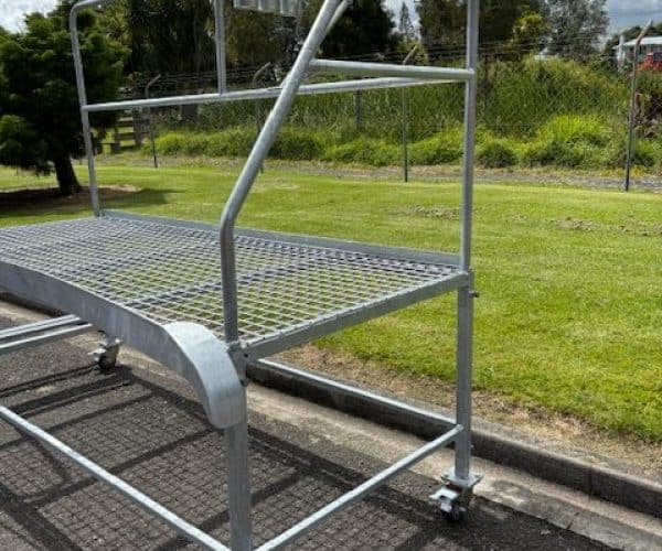 Heavy-duty mobile scaffold platform for construction and maintenance work.