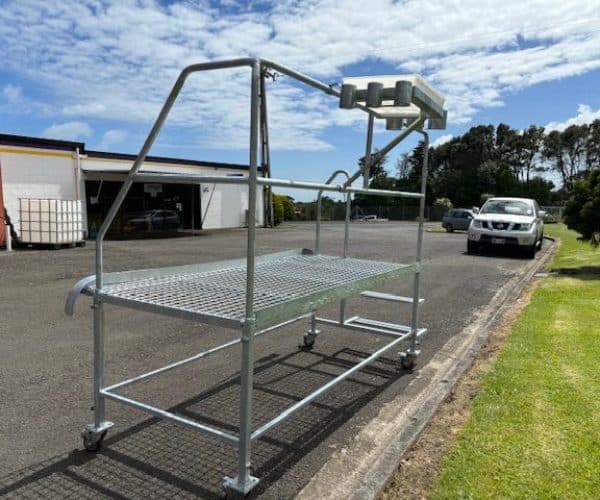 Heavy-duty scaffolding platform with wheels for construction and maintenance tasks.