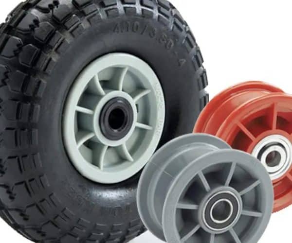 Stylish rubber wheels with plastic rims for various vehicles, perfect for construction or utility use.