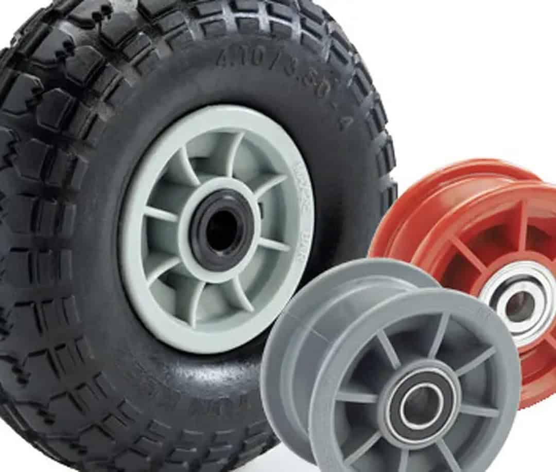 Stylish rubber wheels with plastic rims for various vehicles, perfect for construction or utility use.