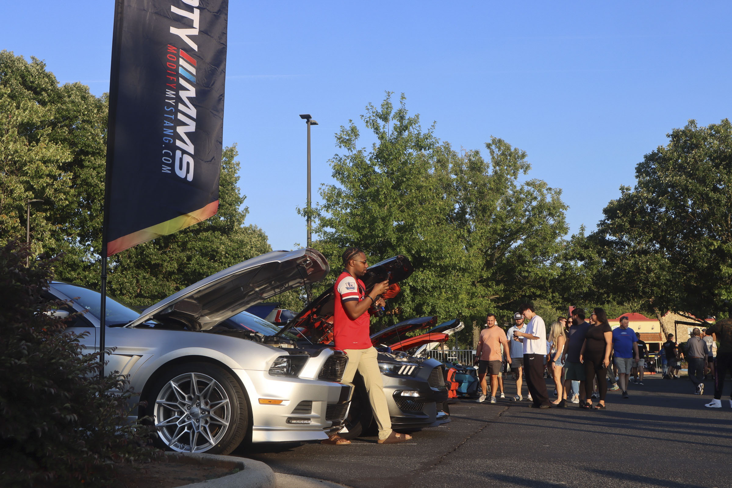 Mustang Week 2026 car show with enthusiasts and classic Ford Mustangs in Charlotte.