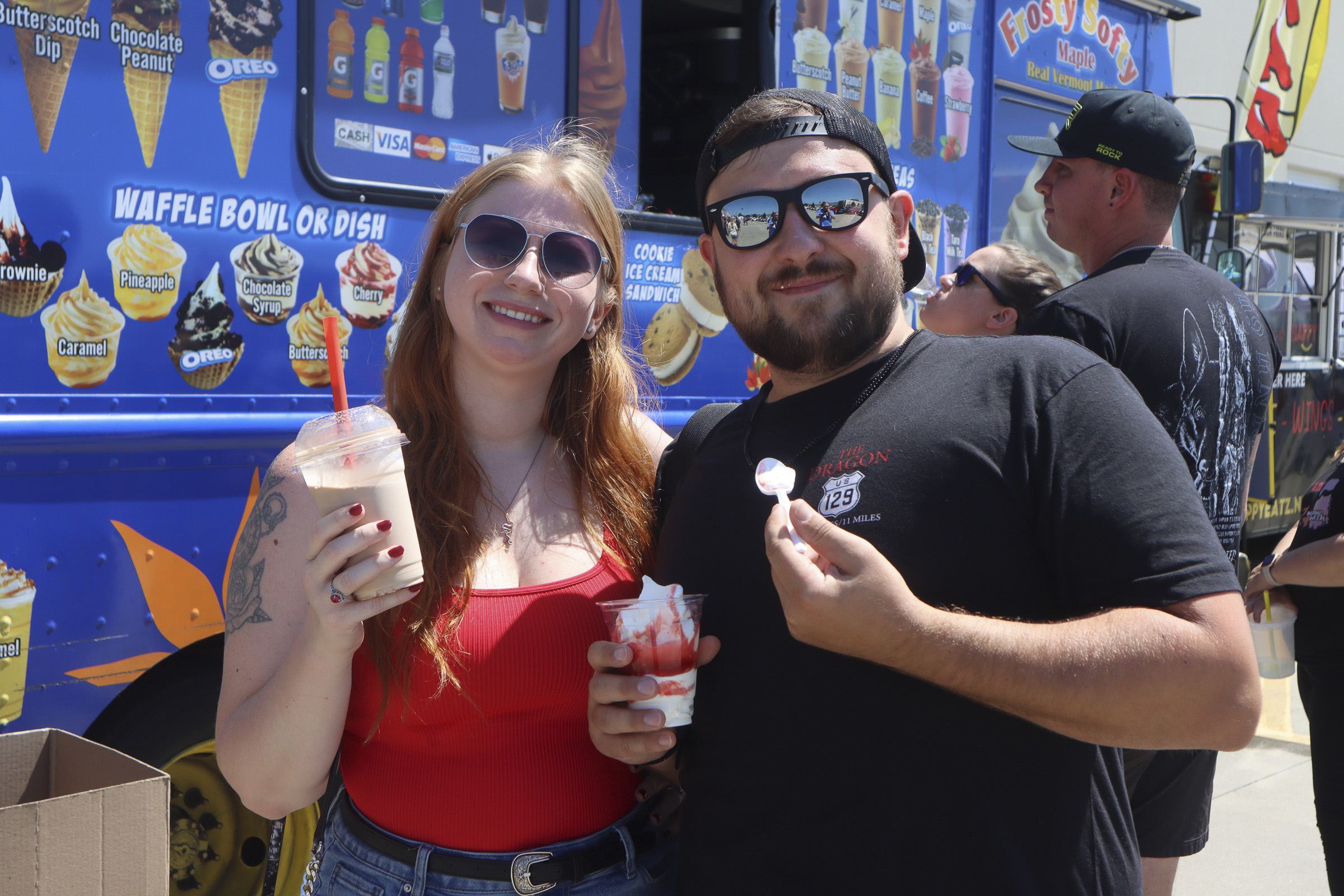 People enjoying ice cream at Mustang Week event in Charlotte 2026.