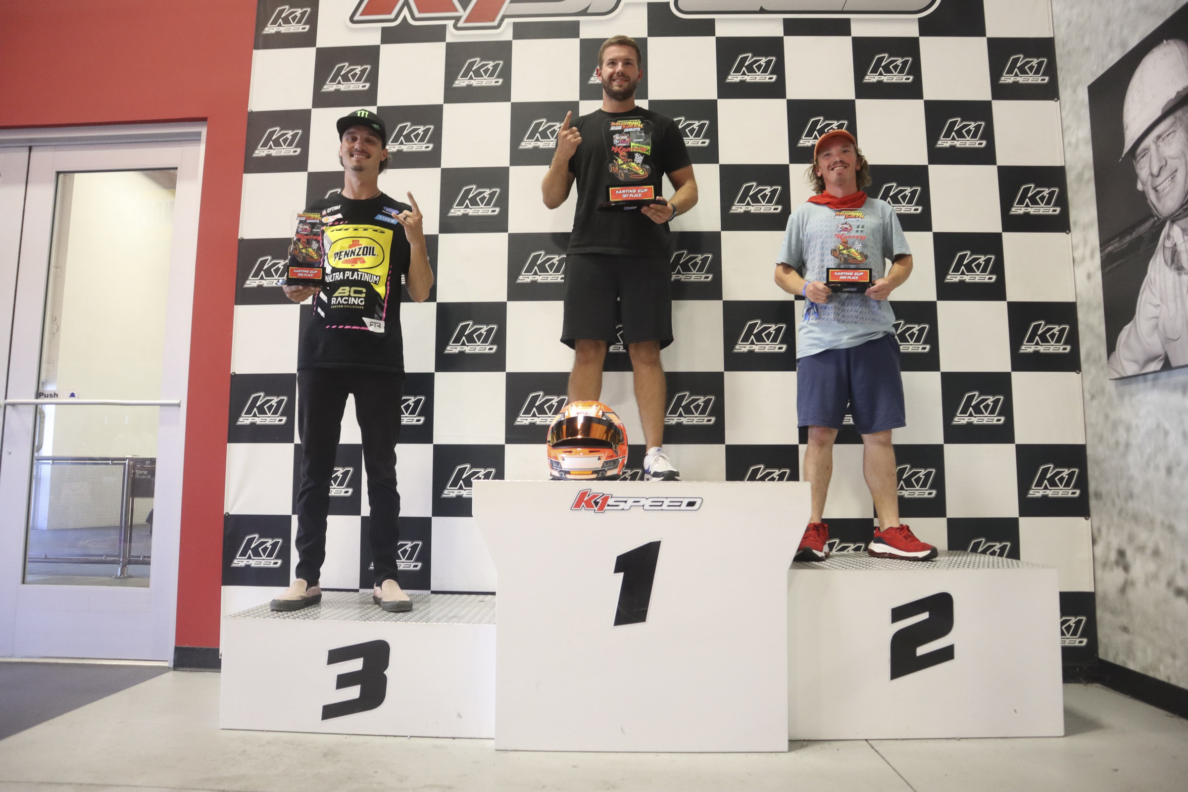 Race winners on the podium at Mustang Week Charlotte 2026 event.