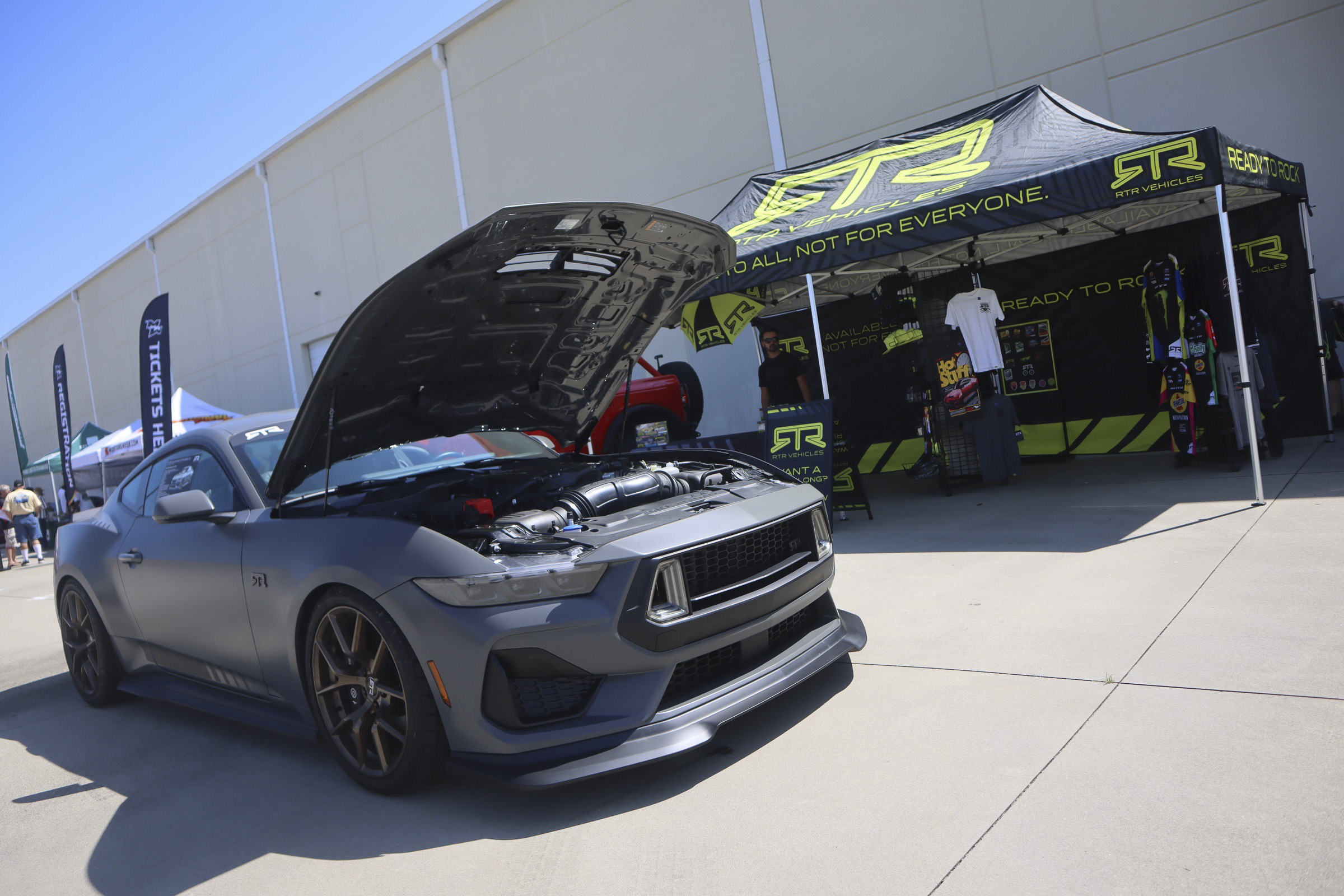 Gray Ford Mustang with open hood at Mustang Week event in Charlotte 2026.