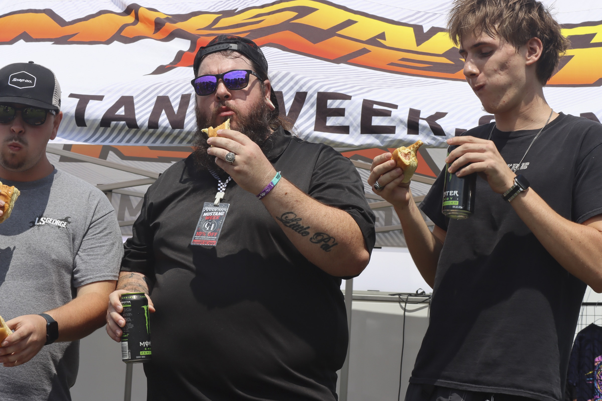 People enjoying food and drinks at Mustang Week car event in Charlotte 2026.