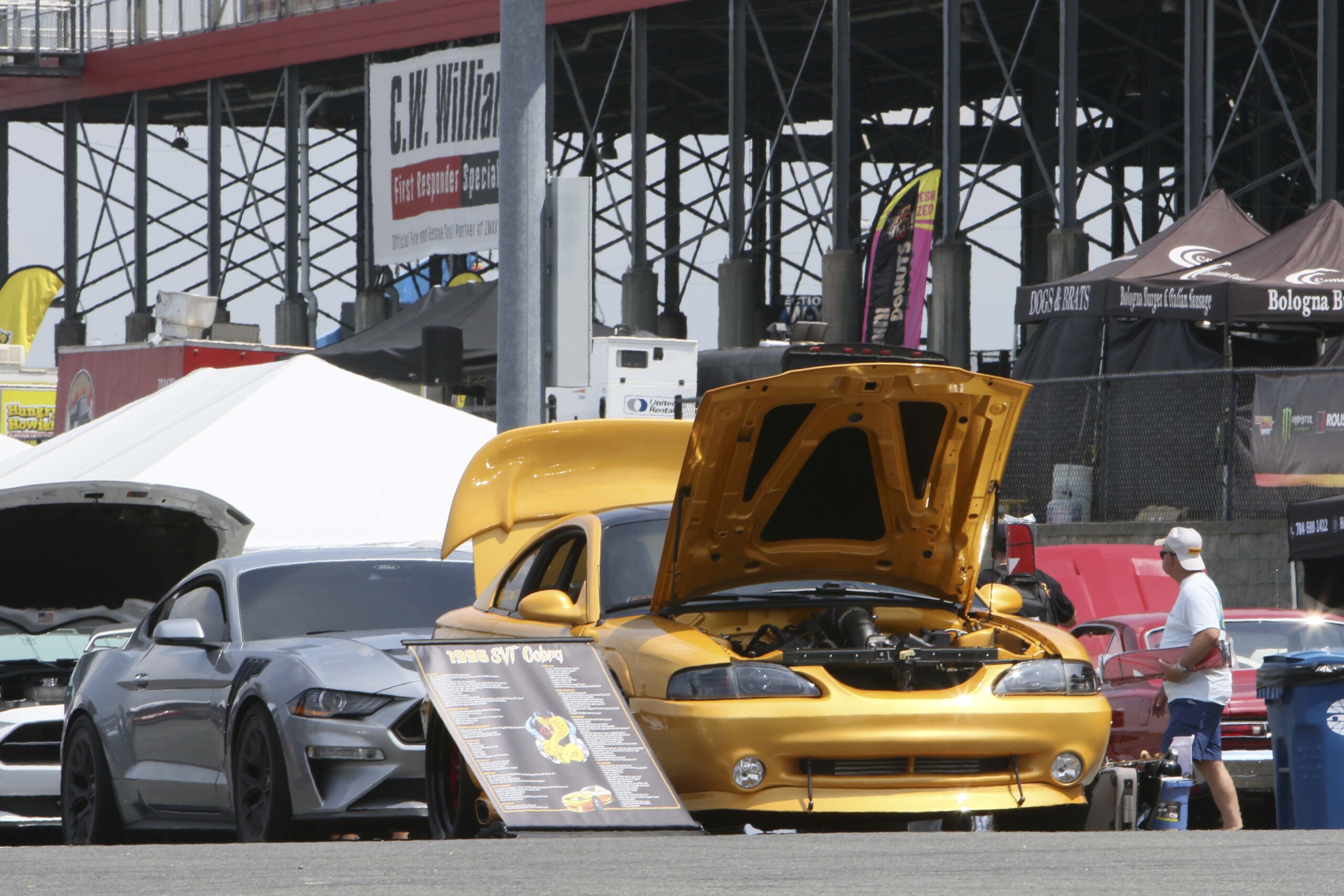 Yellow Ford Mustang at Mustang Week car show in Charlotte 2026.