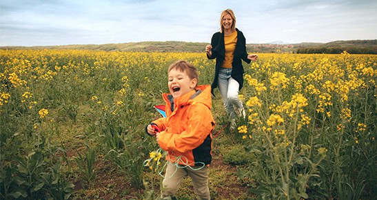 Person enjoying winter outdoors during Meridian Trust CD promotion.