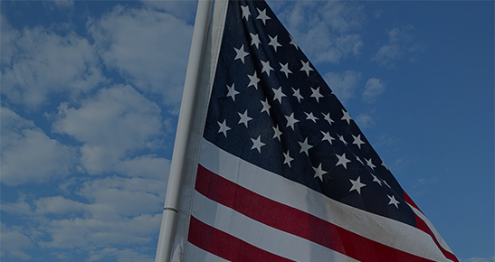American flag waving in the sky during daytime for Flags For Heroes 2026.