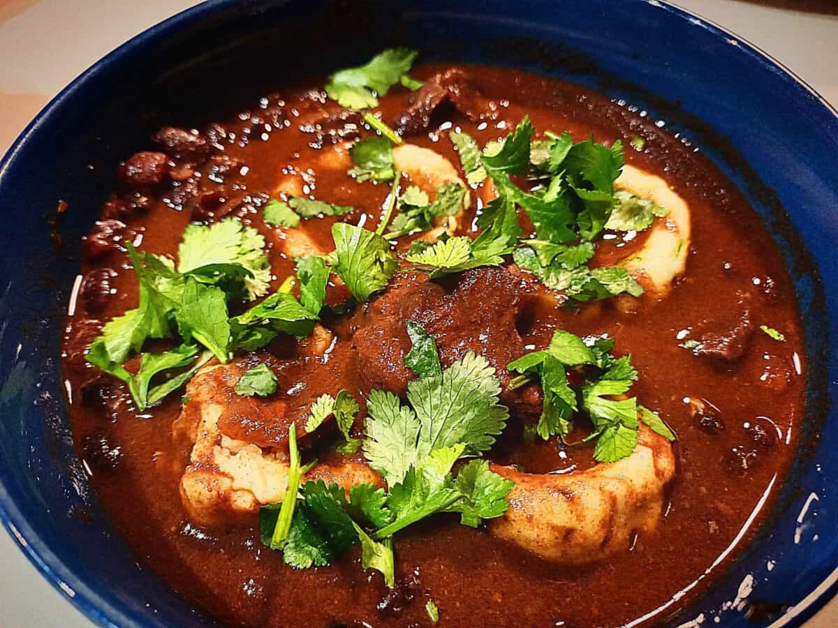 Mexican corn masa dumplings served in a chili stew
