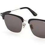 Elegant Tom Ford FT1242-K 01A sunglasses with black frames and grey lenses.