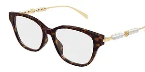 Tortoiseshell eyeglasses with pearl and gold details, perfect for stylish women.