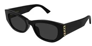 Black Gucci sunglasses with gold logo detail for eye protection.