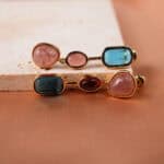 Close-up showing the different colors and textures of each gemstone