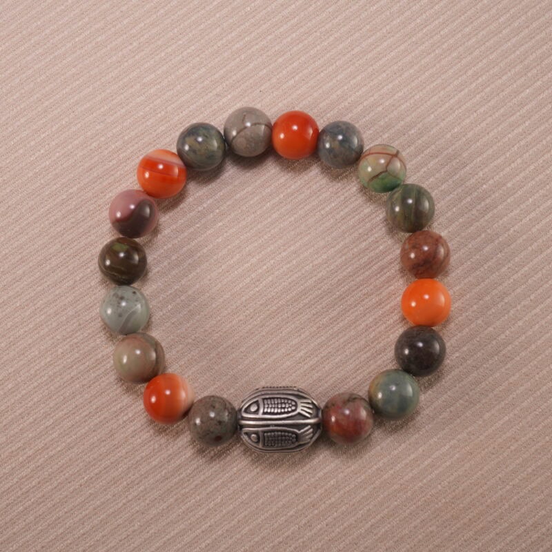 Beaded bracelet made with Alashan stone and S925 silver on white background