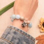 Wearing Aquamarine Clear Quartz Bracelet – Flower Charm Jewelry for Calm and Clarity