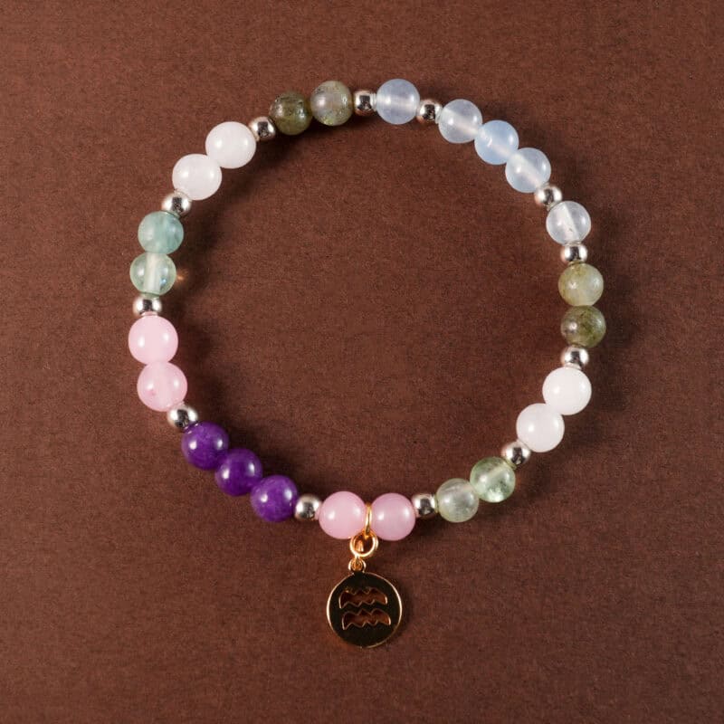 Aquarius bracelet with aquamarine, chalcedony, rose quartz, moonstone, and prehnite beads