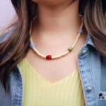 Model wearing the necklace with soft, natural lighting