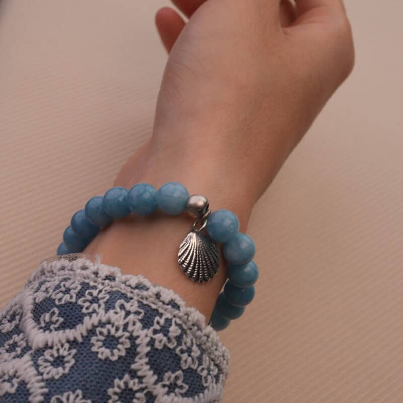 Wearing Chalcedony Charm Bracelet with Seashell – Blue Crystal Jewelry