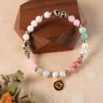 Cancer bracelet resting on wooden surface with soft natural lighting