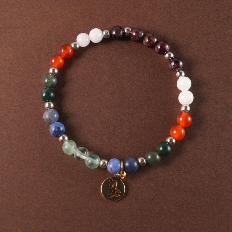 Capricorn bracelet with blue lace agate, prehnite, red agate, and white chalcedony beads