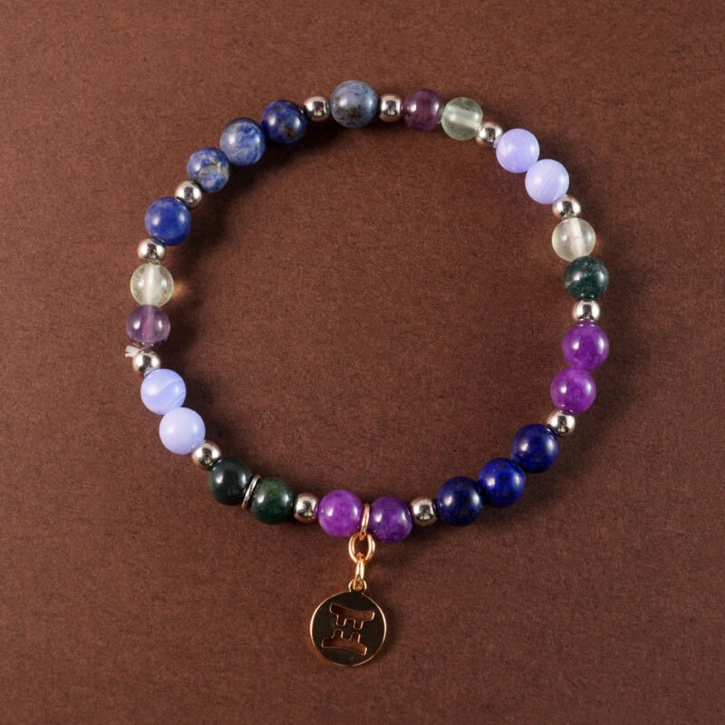 Gemini zodiac gemstone bracelet with blue agate, amethyst, and prehnite