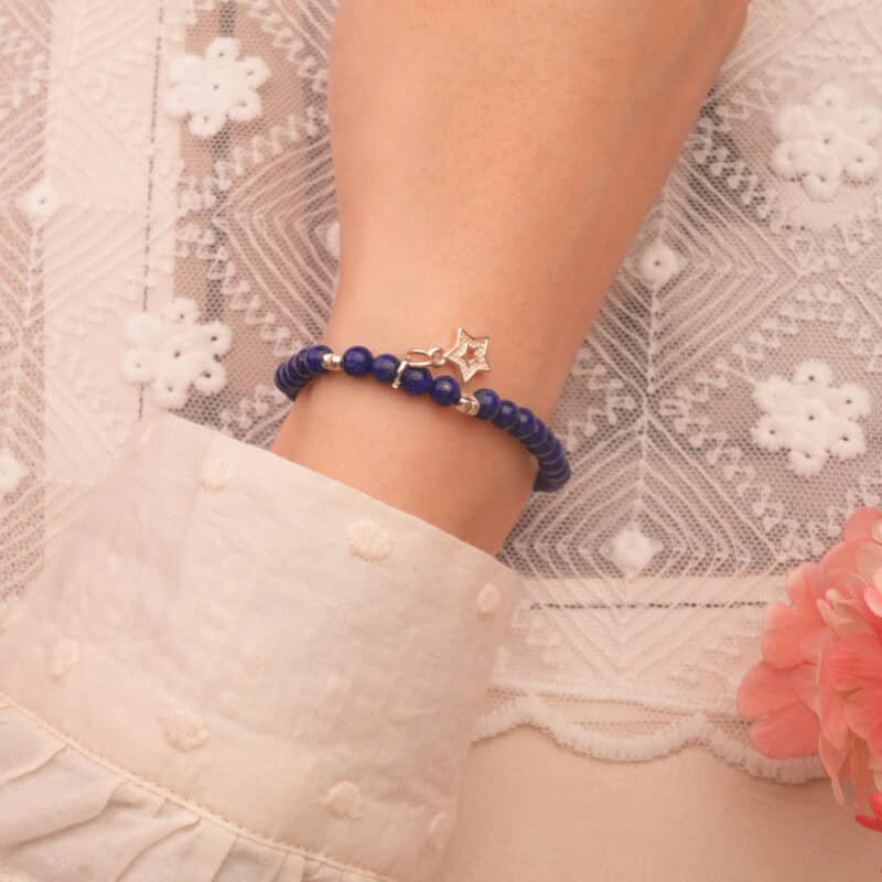 Wearing Lapis Lazuli and White Chalcedony Bracelet with Celestial Star Charm