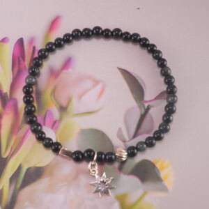 Blue Tiger Eye and Silver Charm Bracelet in Natural Light – Minimal Beaded Energy Jewelry