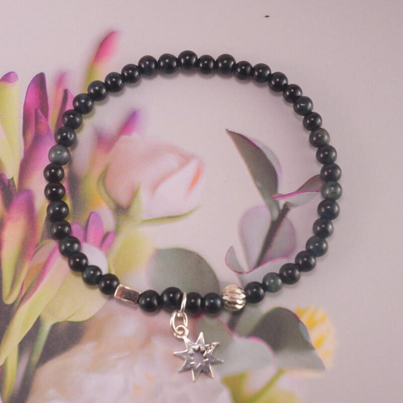 Blue Tiger Eye and Silver Charm Bracelet in Natural Light – Minimal Beaded Energy Jewelry