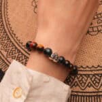 Tiger Eye heart bracelet worn on wrist with natural lighting