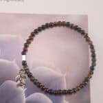 Tourmaline Leaf Bracelet on Natural Surface – Crystal Jewelry Vibes