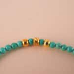 Close-up of natural turquoise beads and knot detail