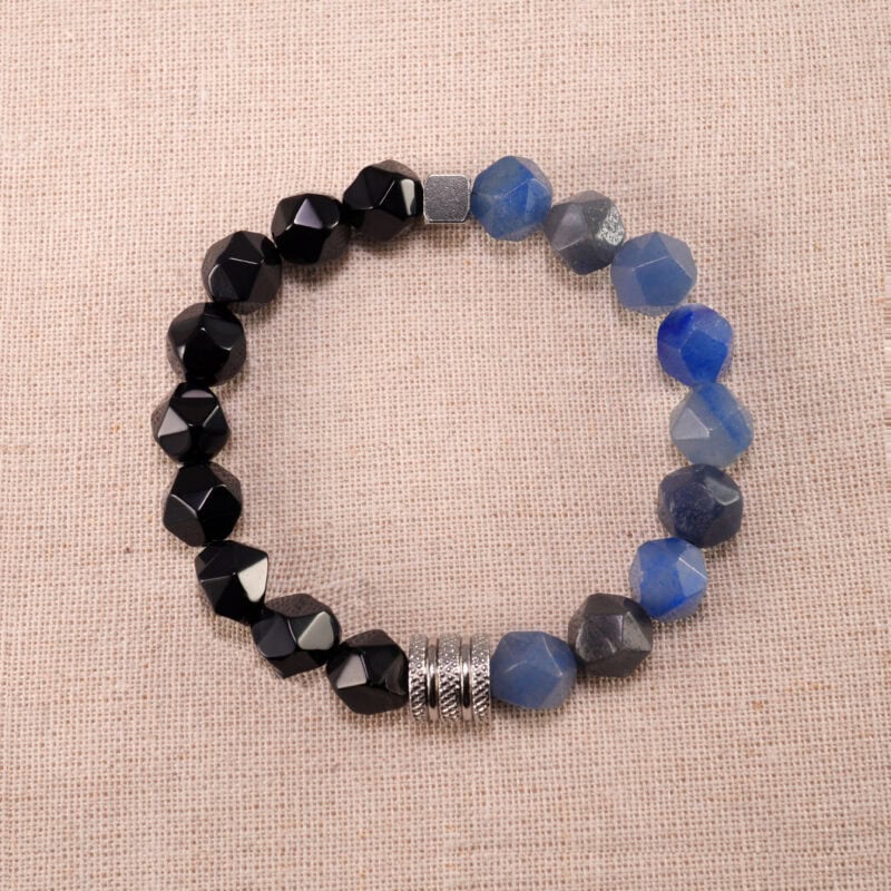 Blue aventurine and obsidian gemstone bracelet on a clean background, showcasing the 8mm beads.
