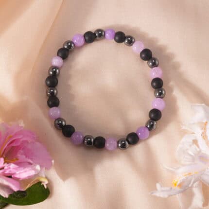 Hematite, aventurine, and tourmaline bracelet on clean white background