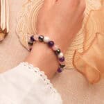 Bracelet worn on wrist, styled with a minimalist outfit, showcasing calming and protective energy.