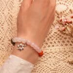 Bracelet worn on a woman's wrist with neutral outfit, showing casual elegance