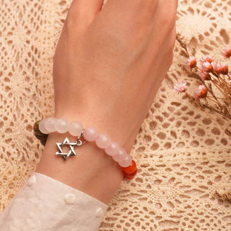 Bracelet worn on a woman's wrist with neutral outfit, showing casual elegance