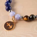 Close-up of Sagittarius zodiac bracelet showing turquoise and tiger eye beads