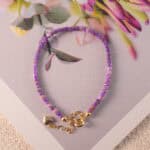 Handmade Amethyst and Chalcedony gemstone bracelet with adjustable cord, designed for balance and spiritual clarity.