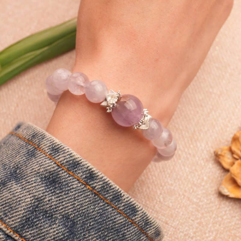 Amethyst bracelet worn on wrist with graceful, relaxed styling