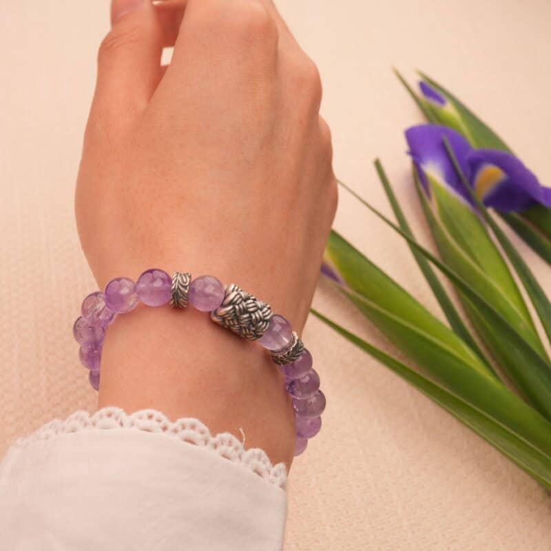 Model wearing the bracelet during a quiet, restful moment, ideal for evening use