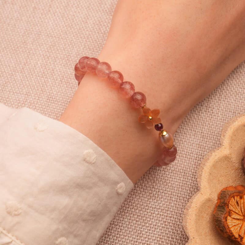 Wearing Strawberry Quartz & Pearl Flower Bracelet – Feminine and Healing Crystal Jewelry