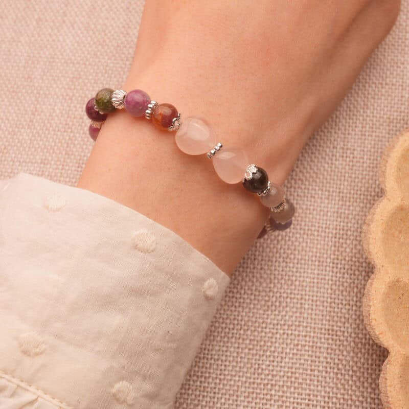 Wearing Tourmaline Bracelet with Silver Cross Charm – Spiritual Gemstone Jewelry