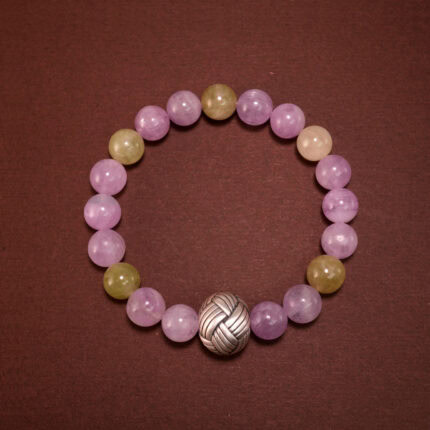 Kunzite and Prehnite healing crystal bracelet on white background