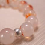 Close-up view of 10mm beads with crystal clarity and polish