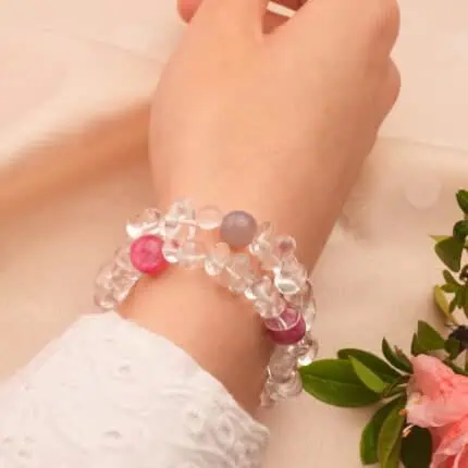 Model wearing the freeform Clear Quartz and Agate handmade bracelet