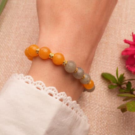 Model wearing yellow chalcedony & moonstone bracelet, casual style